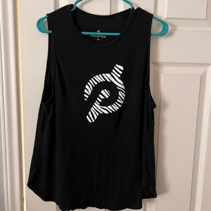 Peloton tank with animal print logo.